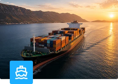 Container ship under way at sunset, loaded with freight